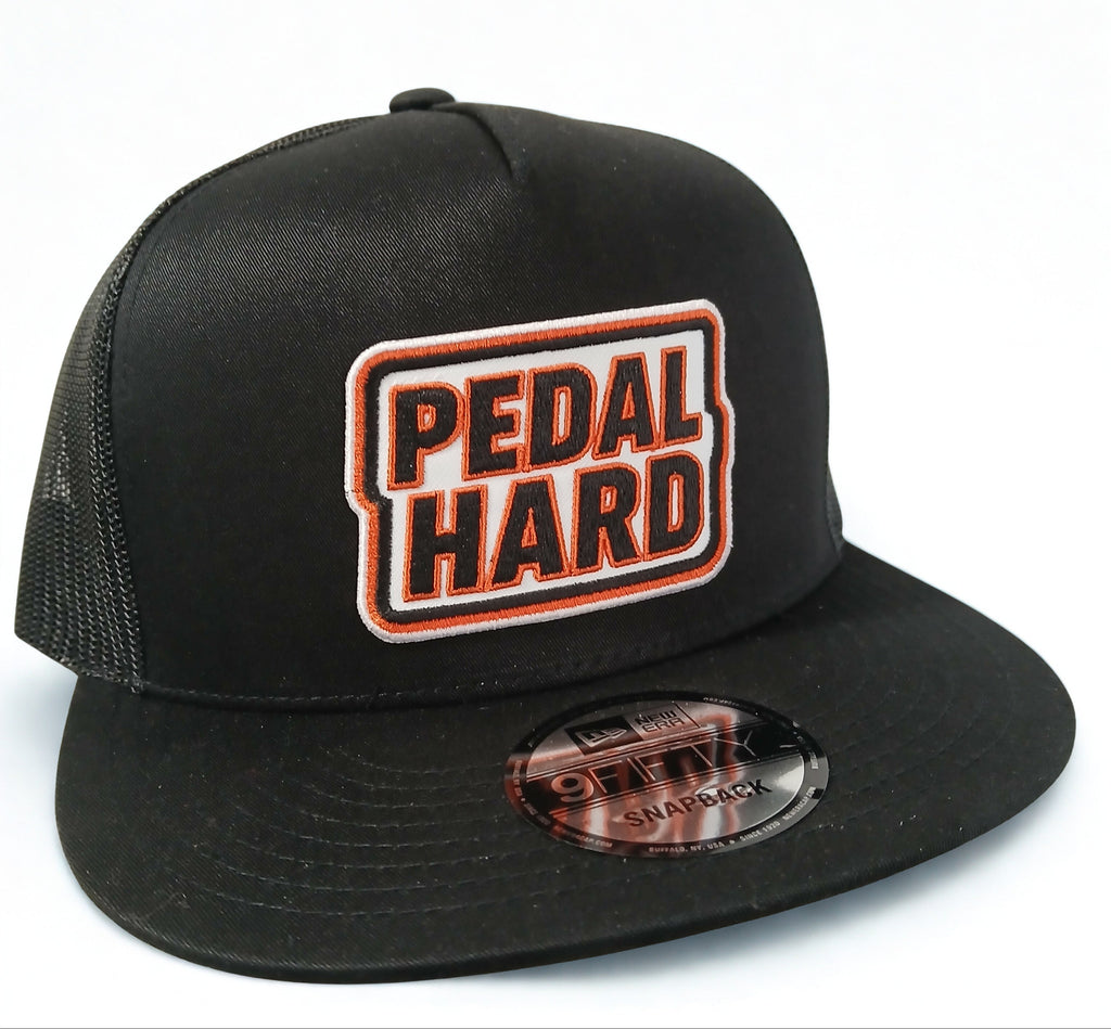 PEDAL HARD Prime Snapback hat front black snapback hat with Bmore Orange logo for BMX MTB and cycling riders