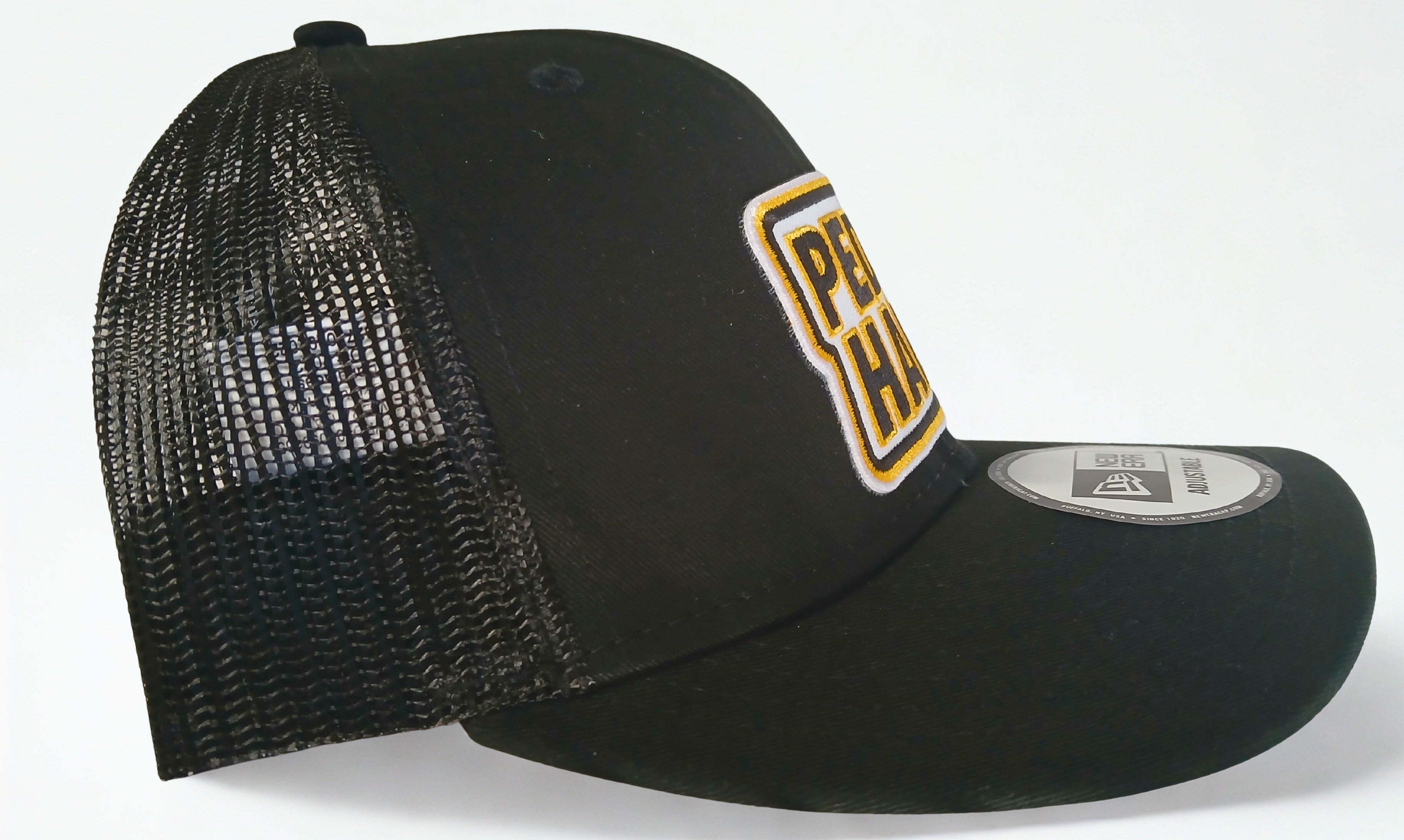 PEDAL HARD Hardline Trucker snapback hat side view black mesh back trucker cap with structured crown and flat bill