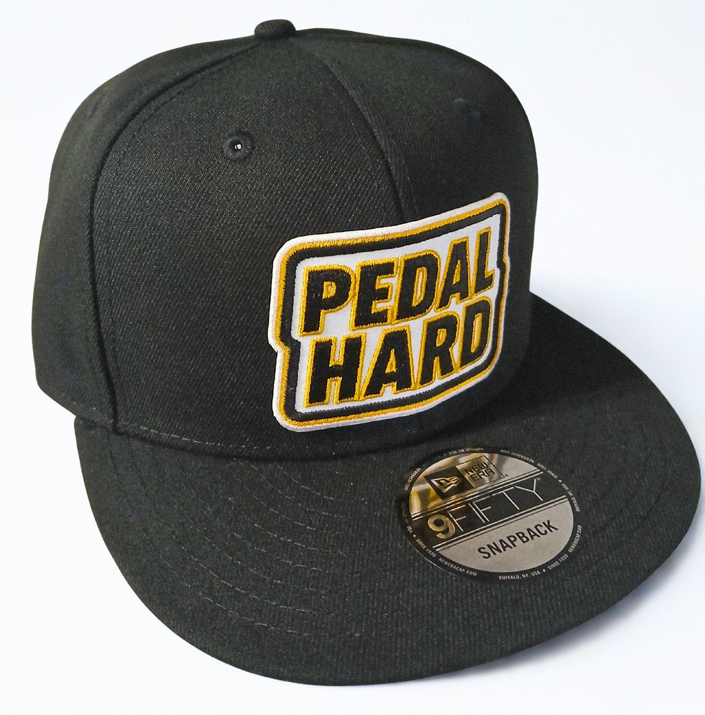 PEDAL HARD Street Snapback hat front view structured flat bill snapback cap designed for cycling streetwear